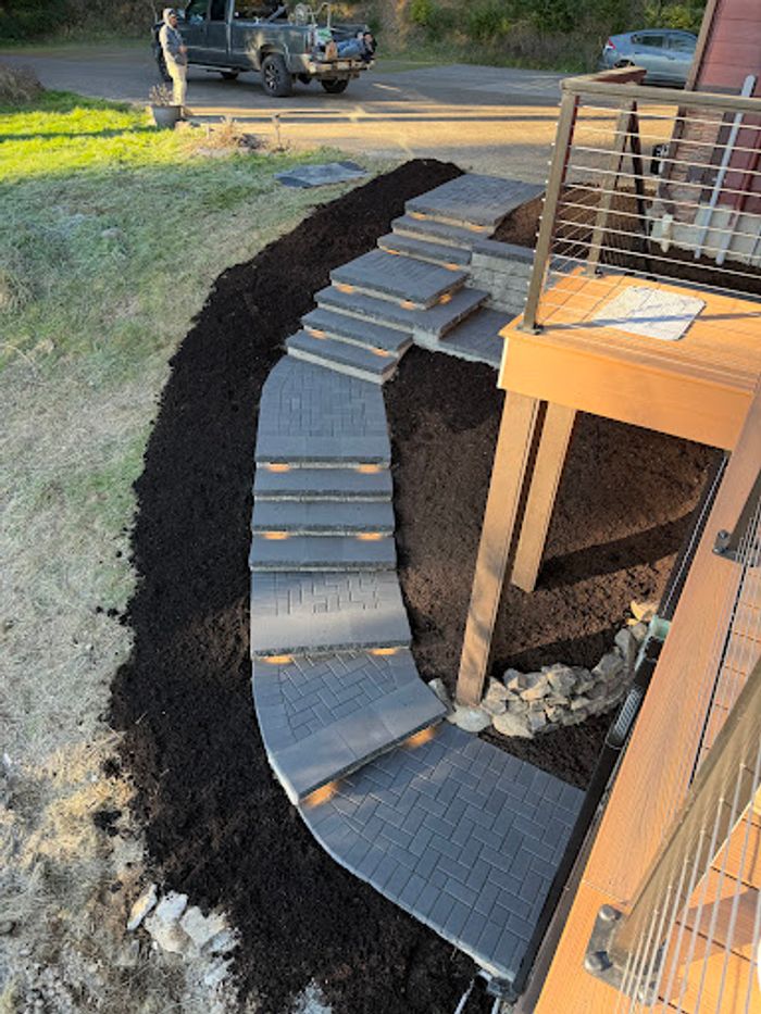 Curved paver walkway with steps