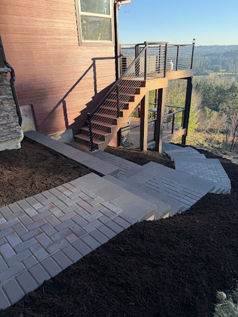 Paver walkway beside a home
